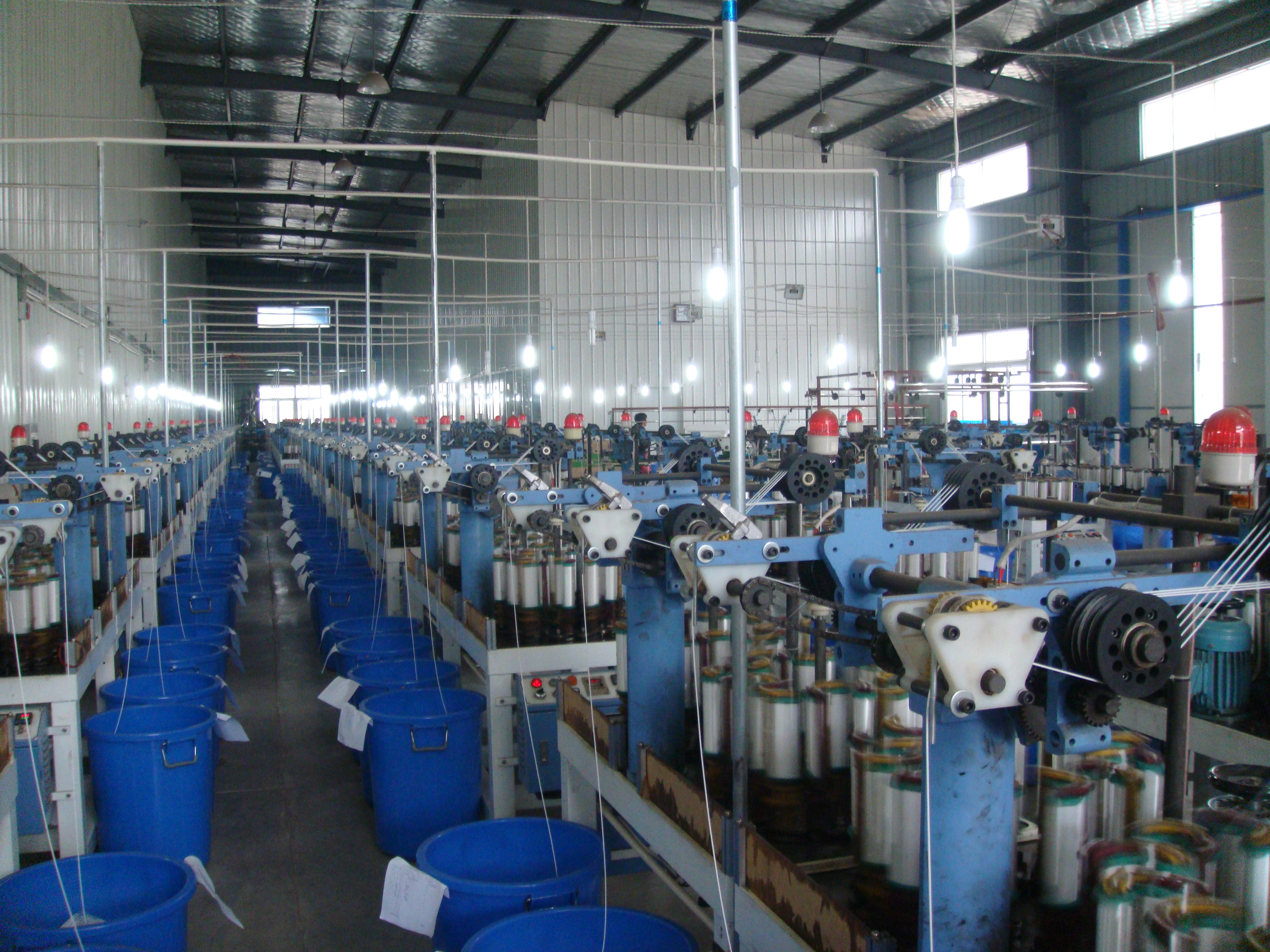 Silica sleeve manufacturing on industrial braiding machine